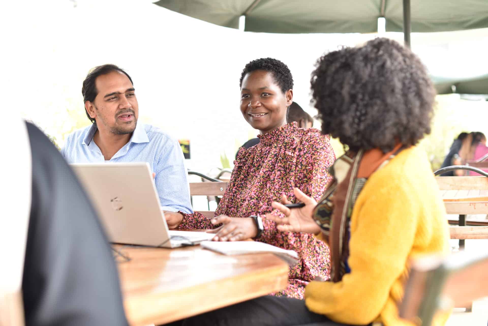 M-Gas employees catching up at the terrace